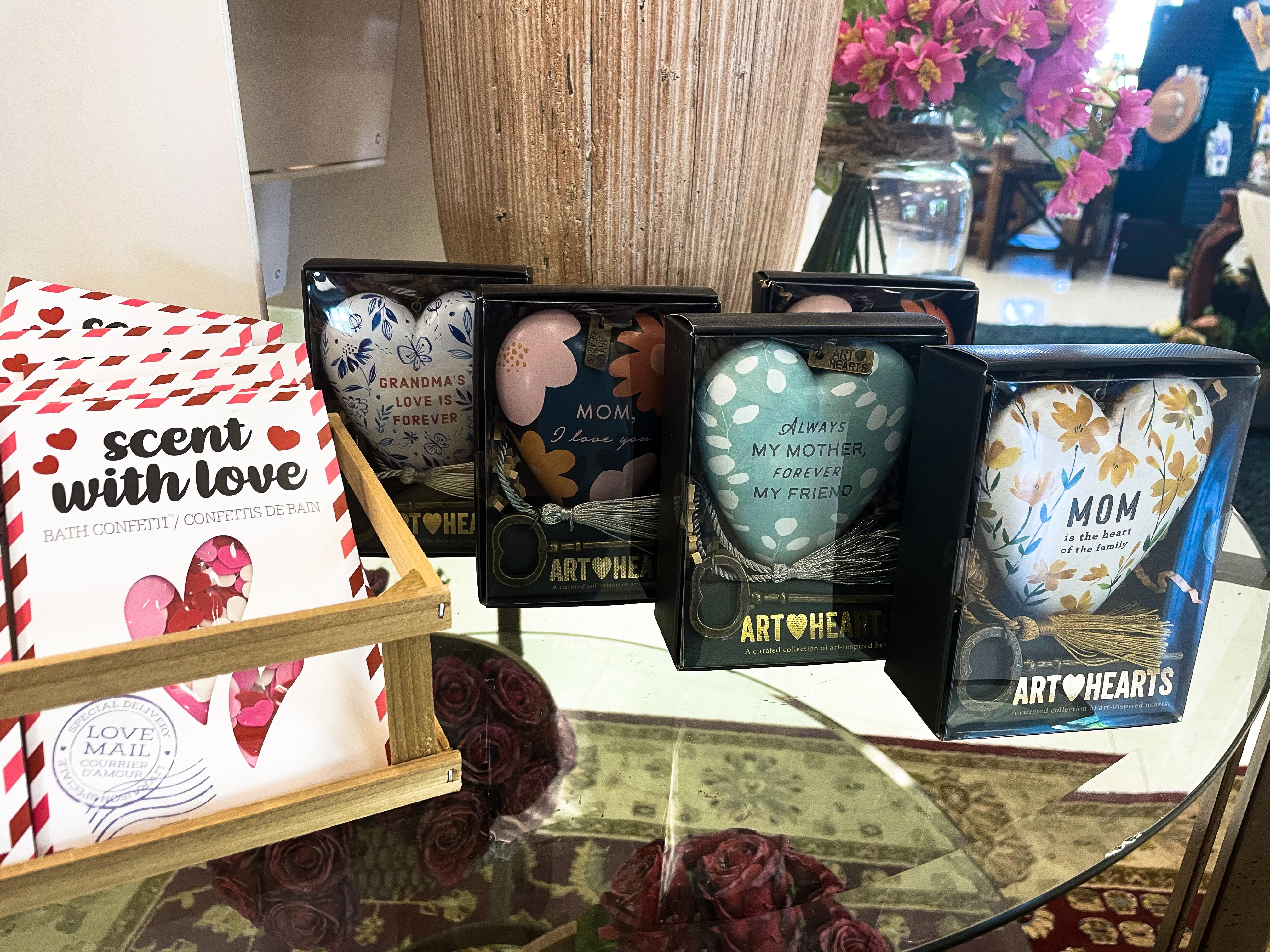Some "special surprises" we've got in stock right now. Left to right: "Scent with Love" bath confetti, Grandmother and Mother Art Heart decor.
